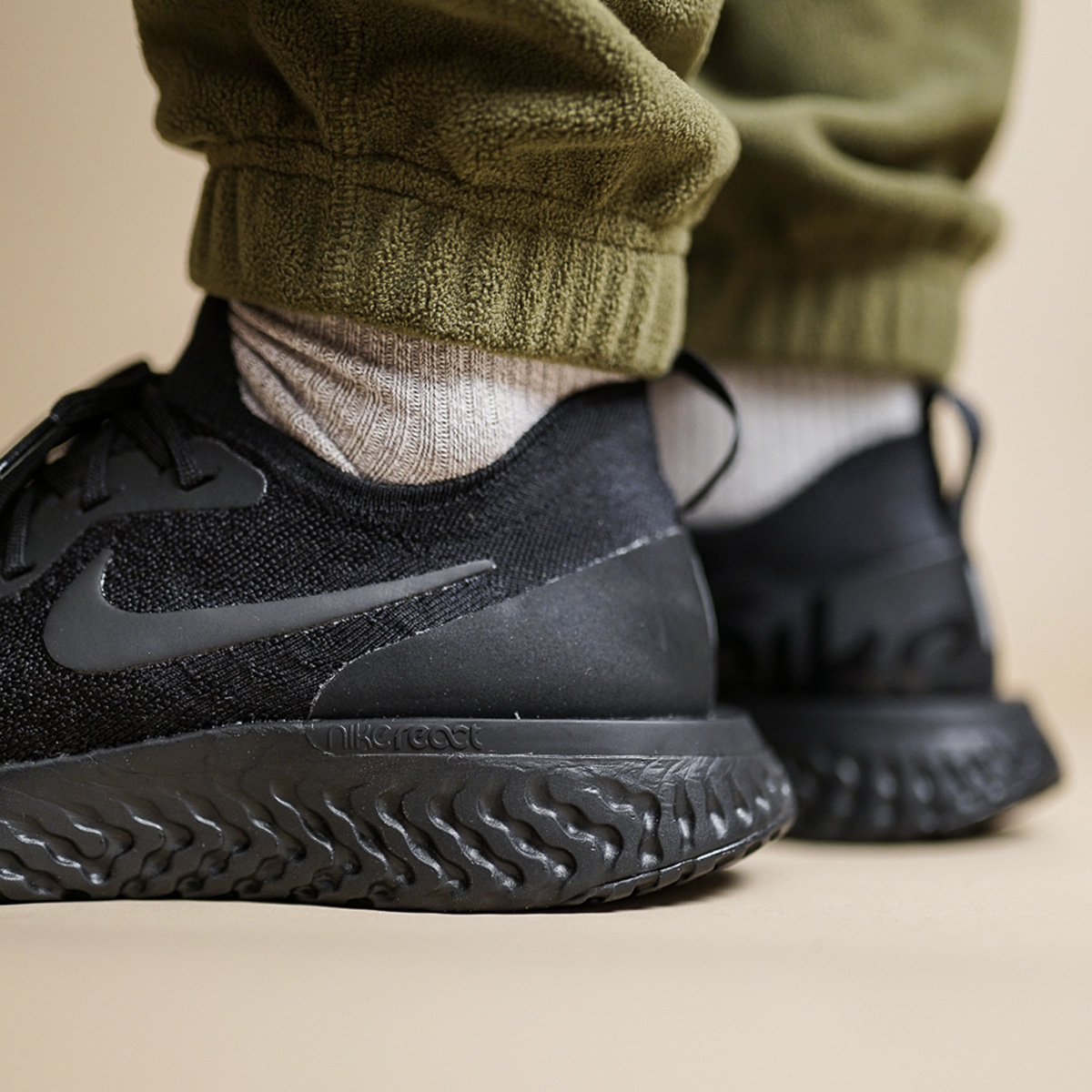 epic react flyknit 2 triple black