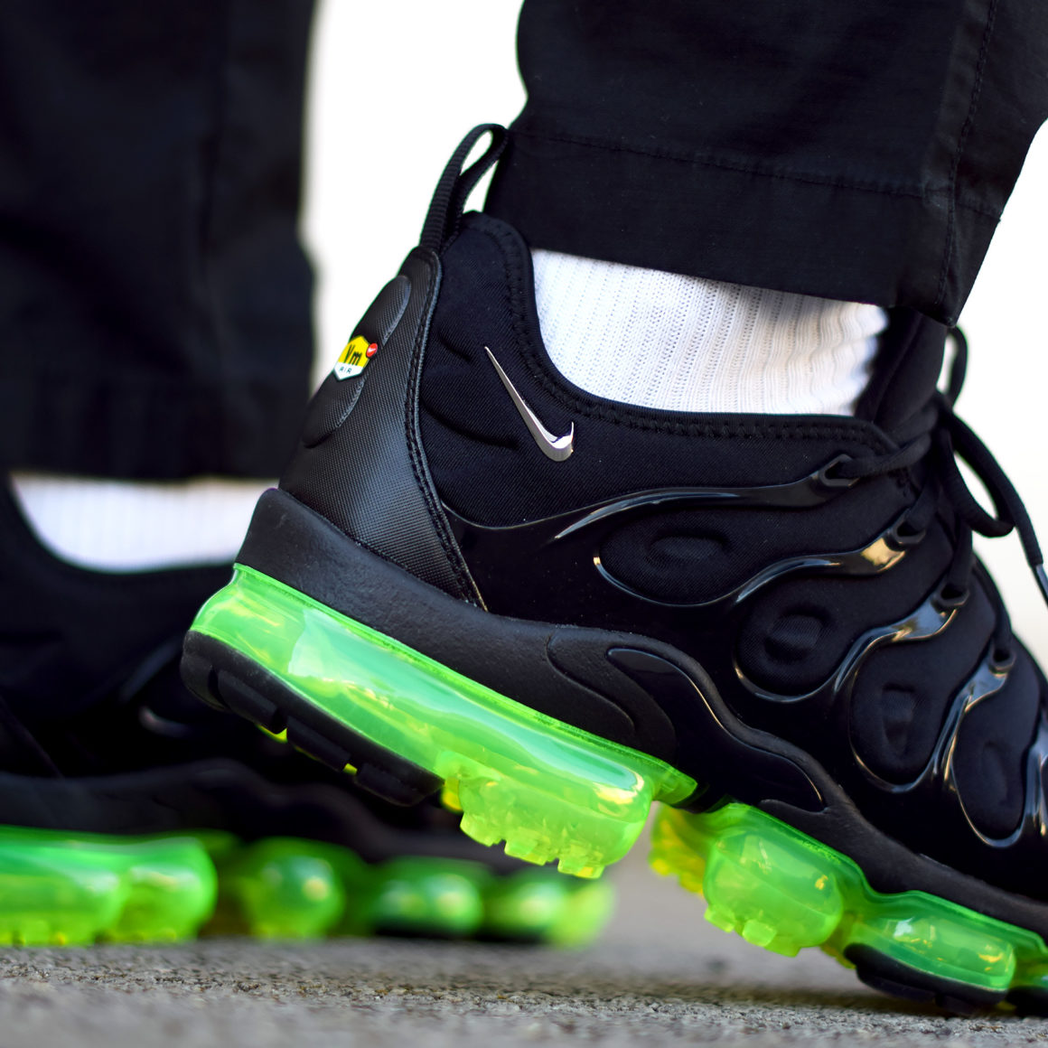 air max plus black volt solar red