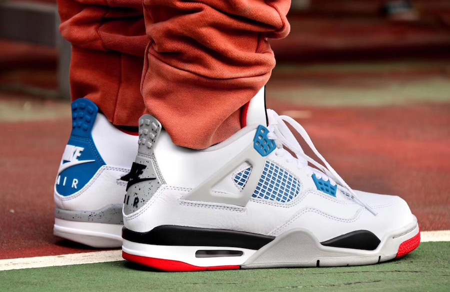 white and blue jordan 4