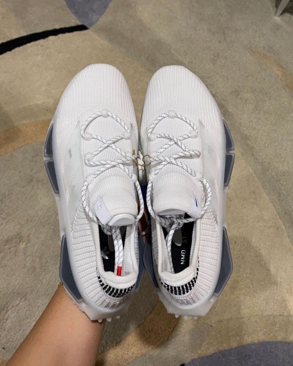 nmd s1 price